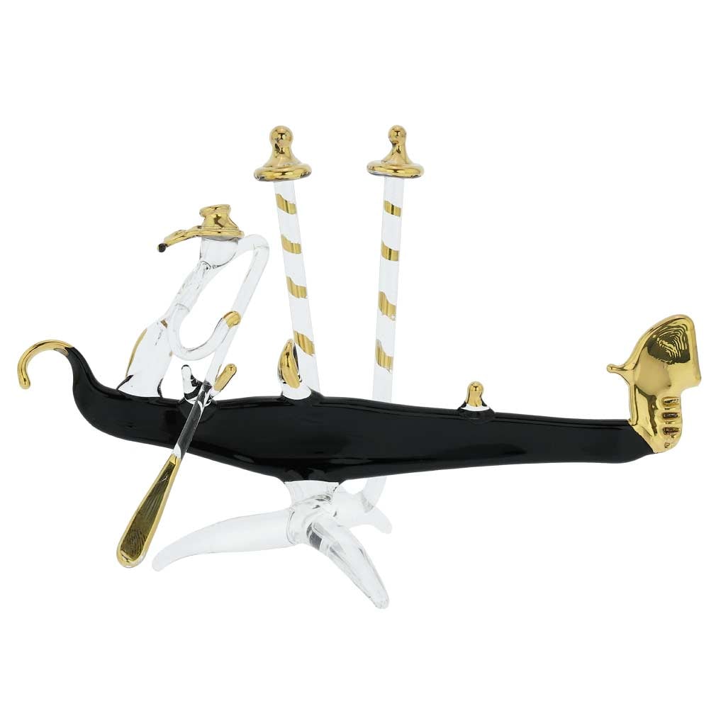 Murano Glass Flat Gondola With Gondolier: Made by Murano's talented and passionate glass artists following centuries of Murano glass-making tradition, this classic black and gold gondola is a timeless symbol of the beauty, elegance, and uniqu