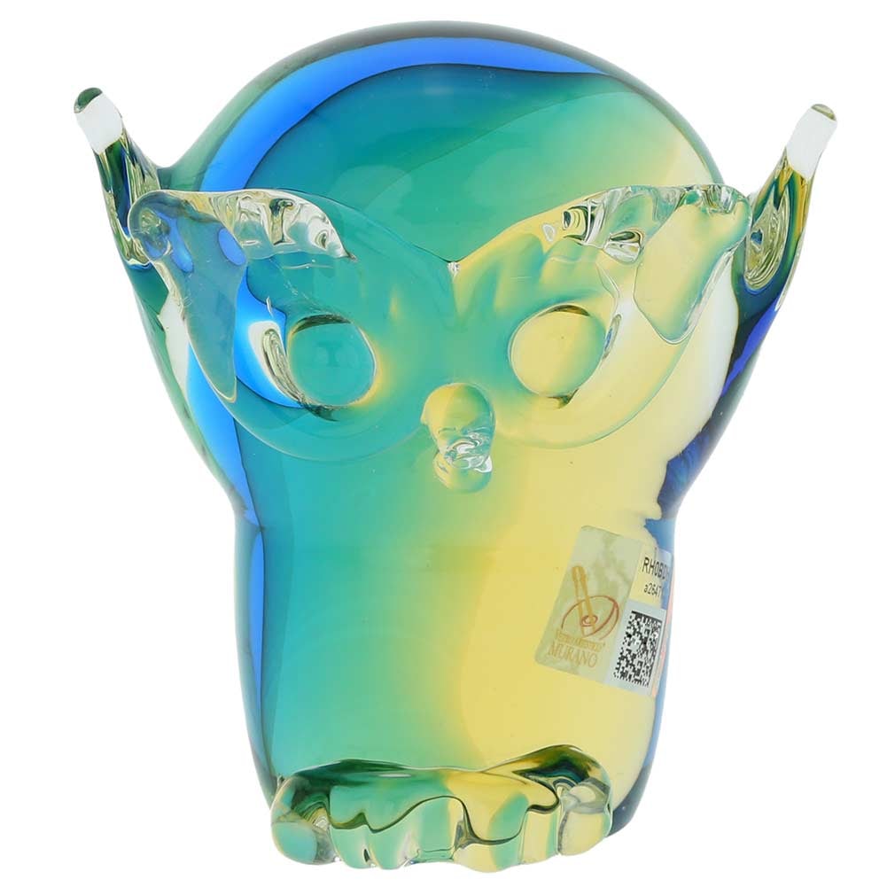 Murano Glass Owl - Amber Aqua: A symbol of wisdom and femininity, this Murano Glass owl adds a touch of elegance to any home or office. This owl was designed and handcrafted on the Venetian island of Murano in a family workshop, wh