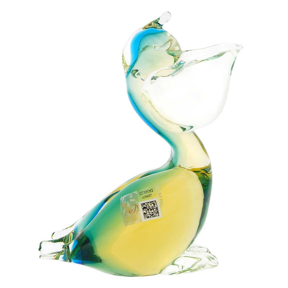 Murano Glass Pelican Bird - Amber Aqua: A fine gift and a lovely home accent, this handcrafted pelican showcases the best features of authentic Murano Glass. Gracious form, rich colors that seem to flow inside the glass and create a delicat
