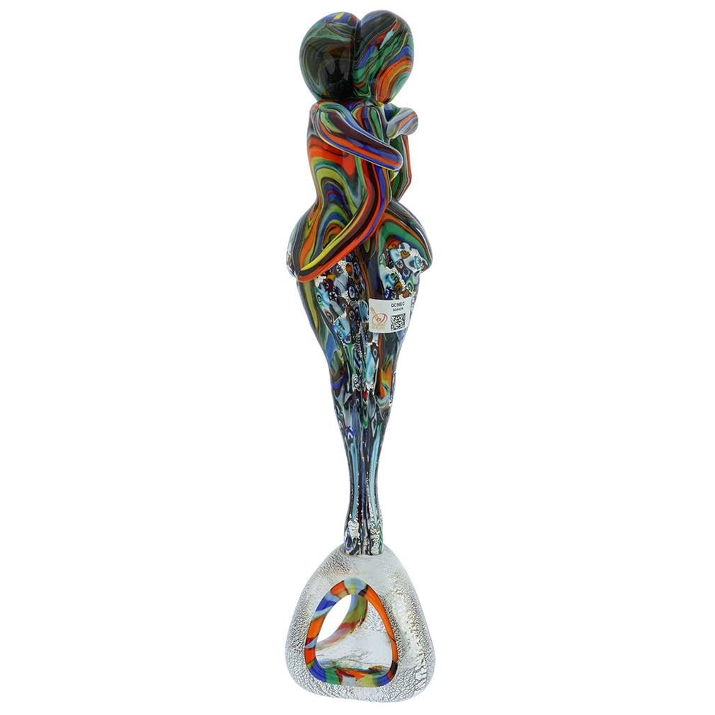 Murano Glass Silver Multicolor Millefiori Lovers On A Base: A symbol of Venetian romance and Italian passion, this figure of Murano Glass Millefiori Lovers in a tight embrace is enchanting and stunning. The artful design is complemented by the perfect craftsma