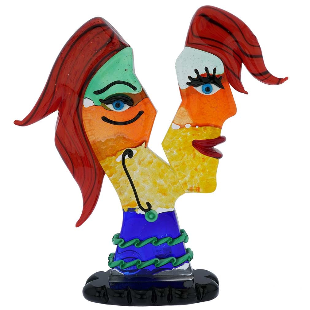 Murano Glass Picasso Head In Two Parts With Red Hair: Murano Glass is a form of art, which draws inspiration from the important artistic trends of the past and present. In a tribute to the greatest and most innovative artist of the 20th century, Pablo Pi