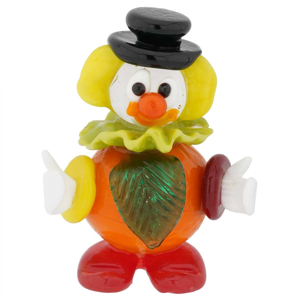 Murano Glass Small Clown - Orange: This adorable handcrafted Murano Glass Clown figurine is made in a traditional glass-making workshop on Murano Island, where highly skilled artisans have been creating beautiful art glass for centurie