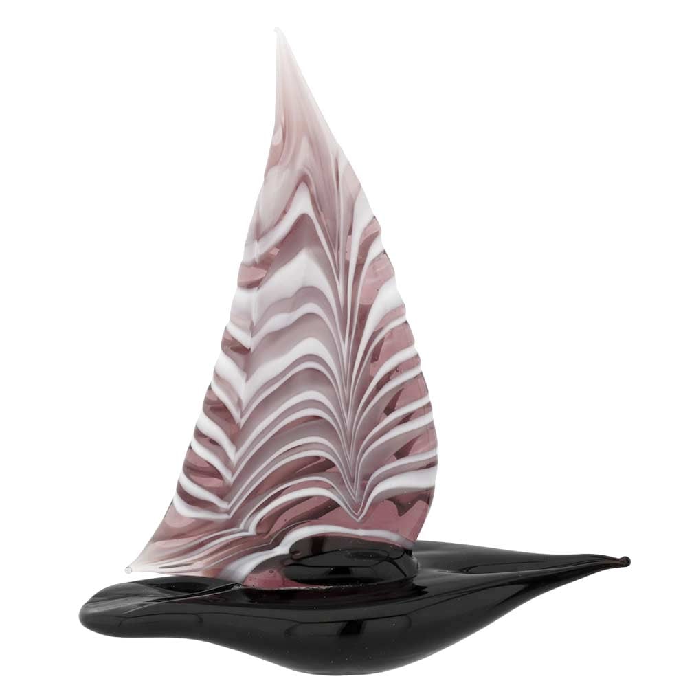 Murano Glass Small Sailboat - Purple: Feel the salty air, imagine the far-away lands, and get immersed in the ever-changing beauty of the sea when you look at this exquisite handcrafted Murano Glass sailboat figurine. The graceful boat pr