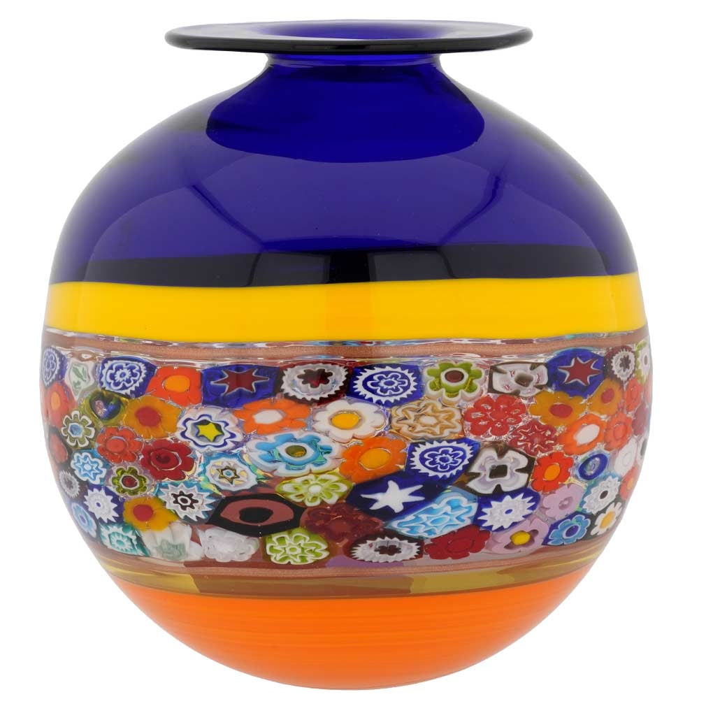Murano Glass Primavera Millefiori Vase Bud - Blue: Get ready to be blown away by the beauty and richness of this Murano Glass Vase. Showcasing all the features that brought Murano Glass masters their enduring fame, this vase is like the quintessence o