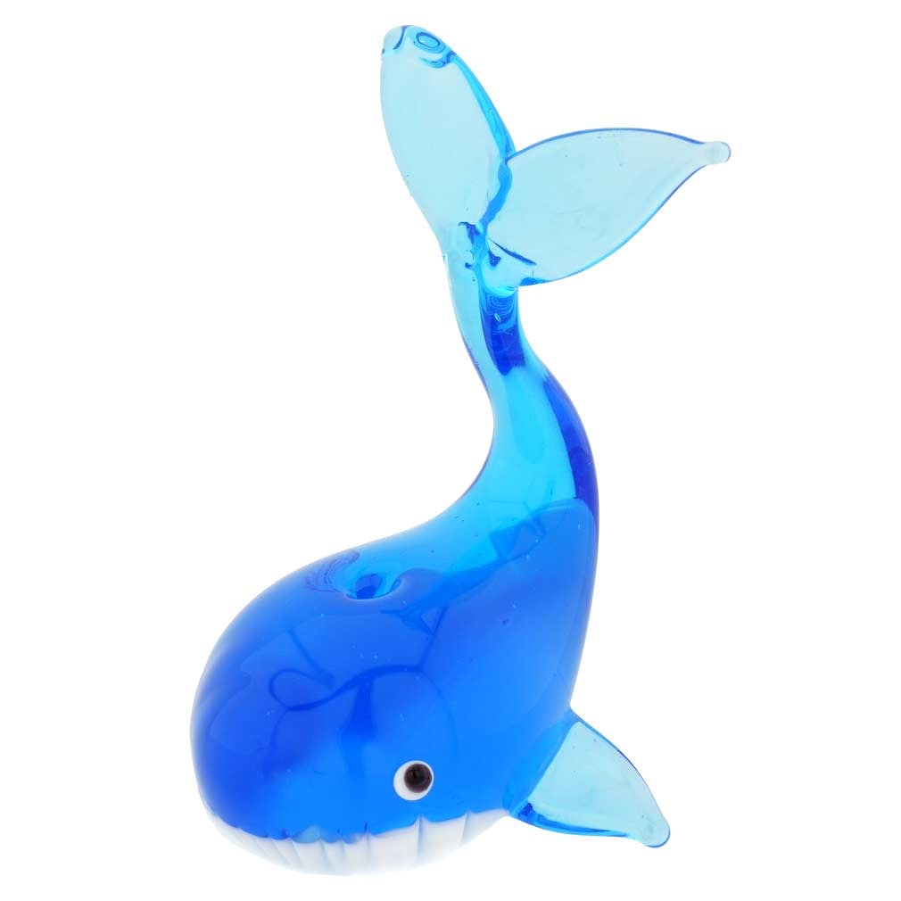 Murano Glass Whale - Blue: This playful Murano Glass Whale is ready to jump into the waves, conjuring up images of exotic seas and beautiful faraway lands. This cute whale figurine was crafted on Murano island using the lampwor