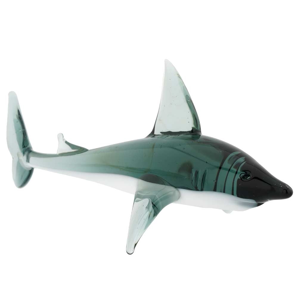 Murano Glass Shark Figurine - Grey: Immerse yourself in the beauty of Italian art with this elegant shark figurine. This fine Murano Glass shark brings a hint of the ocean's beauty into your home. Its intricate details are meticulously 