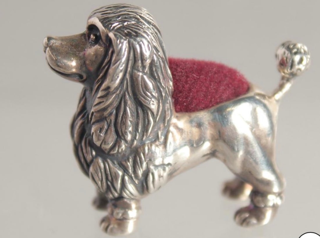 SILVER POODLE PIN CUSHION: Sterling silver with a plush velvet cushion insert.