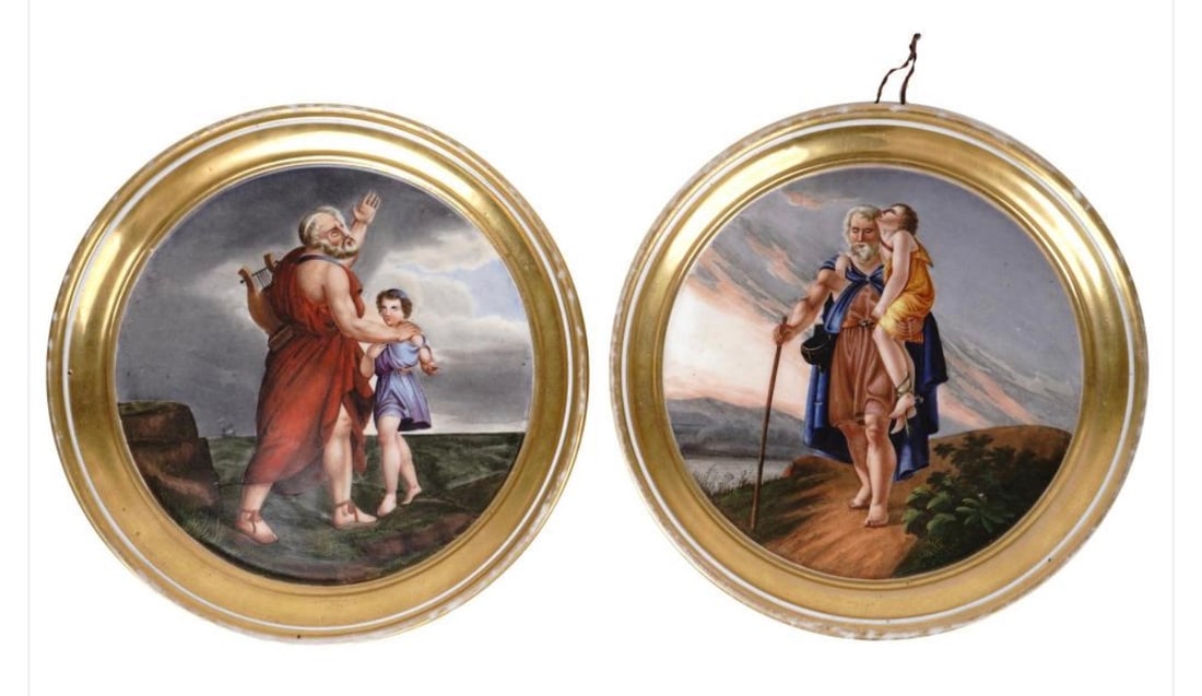 Pair of 19th Century Hand-Painted Porcelain Plaques: Pair of antique round porcelain wall plaques, each finely hand painted with a neoclassical literary scene and bordered by broad gilt rims. One depicts the blind poet Homer guided by a youthful compani