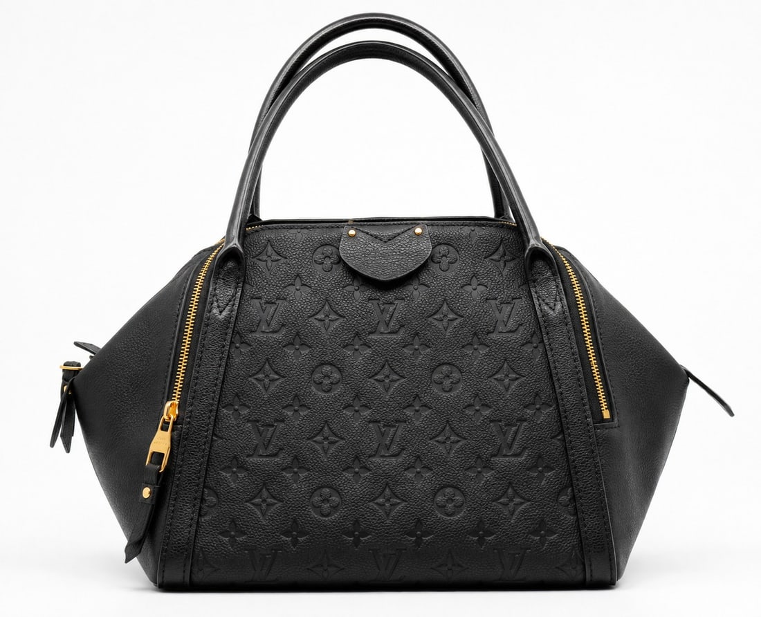 Louis Vuitton Black Monogram Empreinte Leather Maida Hobo Shoulder Bag: Louis Vuitton Maida hobo shoulder bag crafted in luxurious black Monogram Empreinte grained leather with embossed Monogram pattern. This elegant and versatile design features a spacious silhouette wit