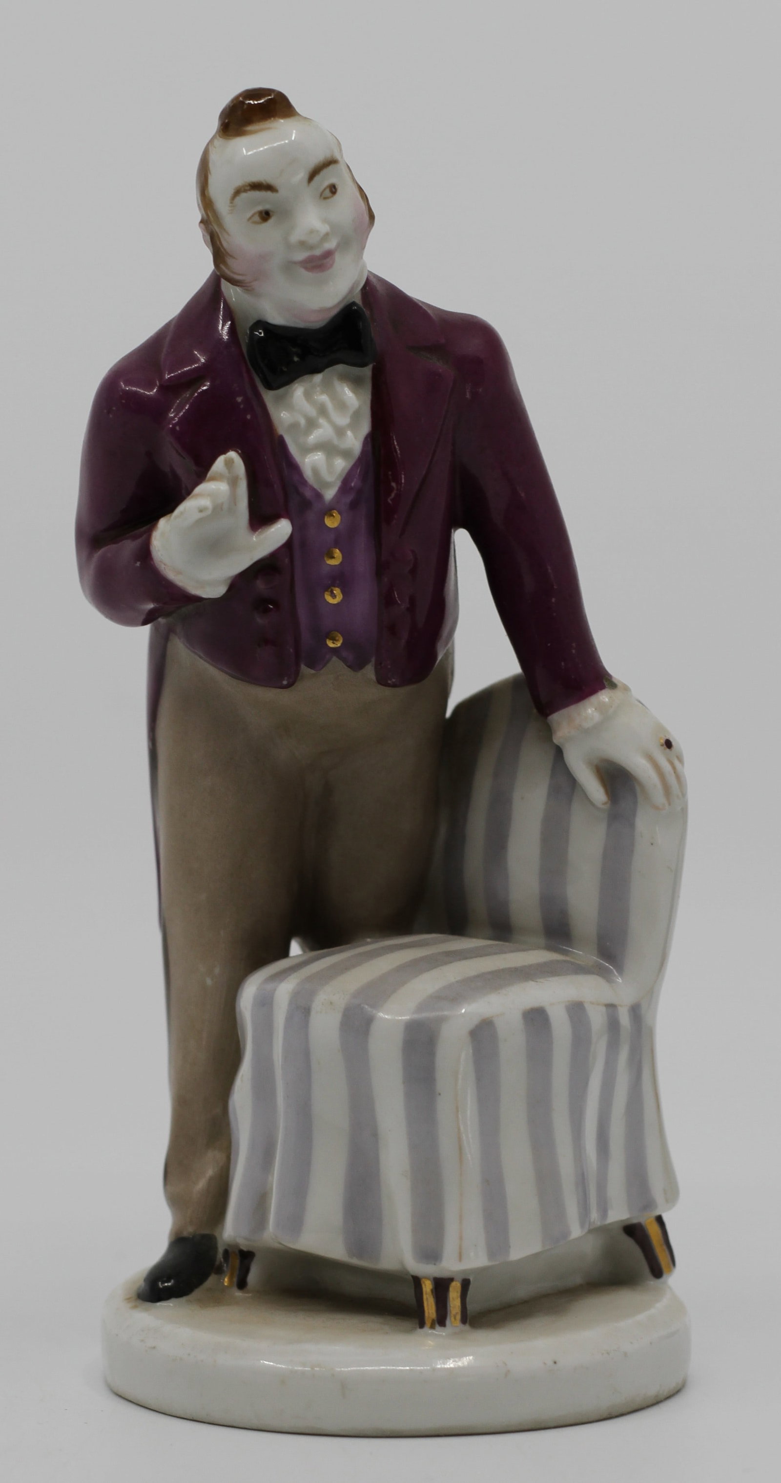 LFZ Chichikov Porcelain Figure by Boris Vorobyov: Soviet porcelain figure depicting Pavel Chichikov from Nikolai Gogol Dead Souls. Designed by Boris Vorobyov with decoration by Ivan Riznich for the Lomonosov State Porcelain Factory. Hand painted figu