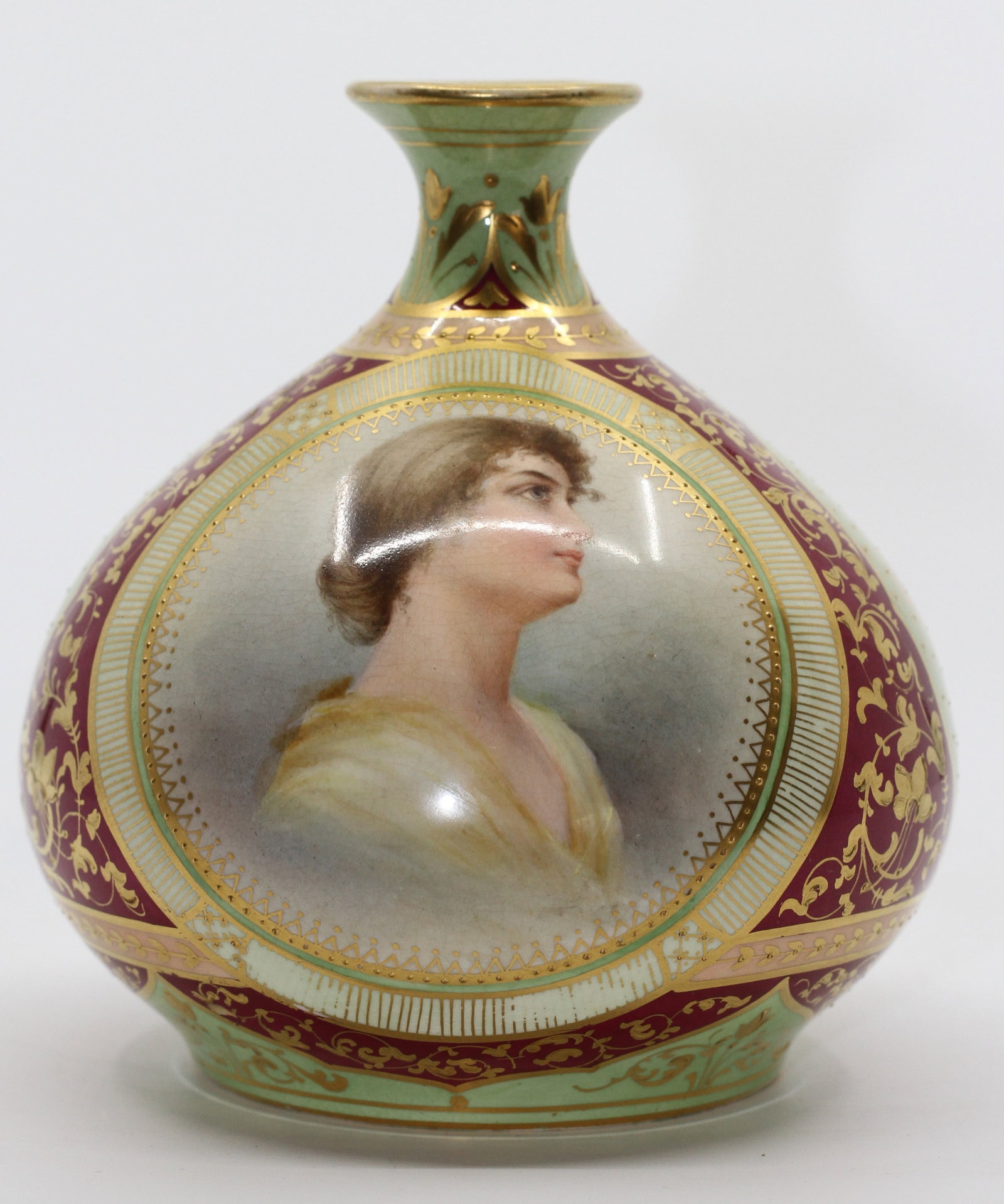 Bonn Germany Hand Painted Portrait Vase: Antique porcelain vase by Bonn Germany with hand painted female portrait and landscape panels. Decorated with burgundy green and gilt neoclassical ornament. Marked on base.