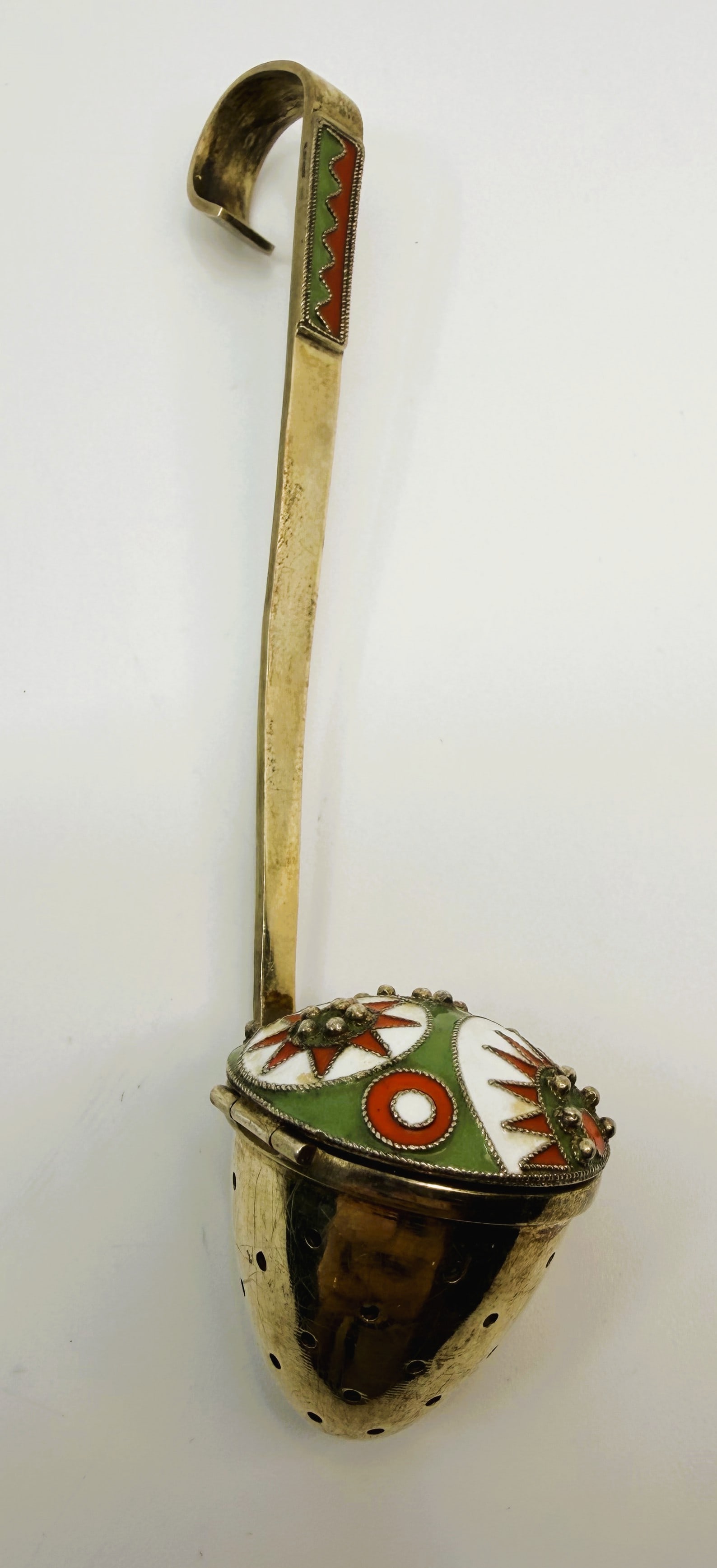 Russian 916 Silver Enamel Tea Strainer: Vintage Russian 916 silver tea strainer with long hooked handle and hinged domed lid. Decorated with green red and white enamel geometric motifs and applied silver bead details. Handle bears 916