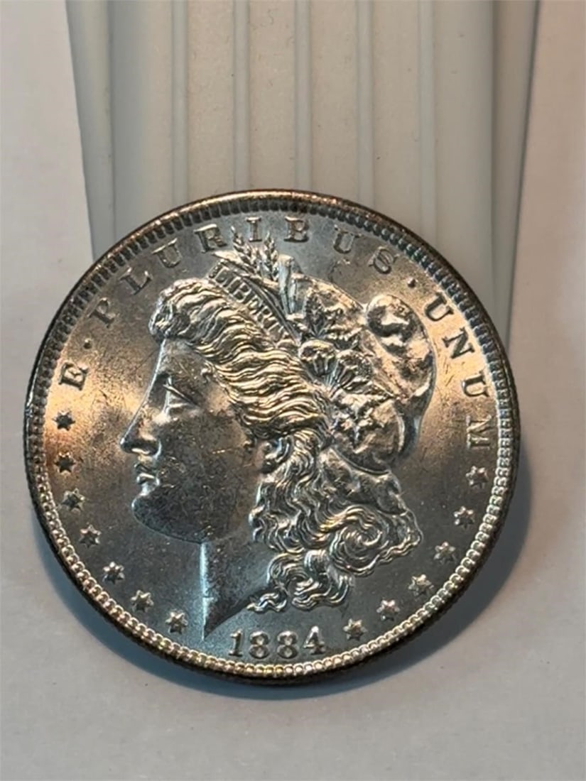 1884 Morgan Dollar: Please refer to pictures for item condition.