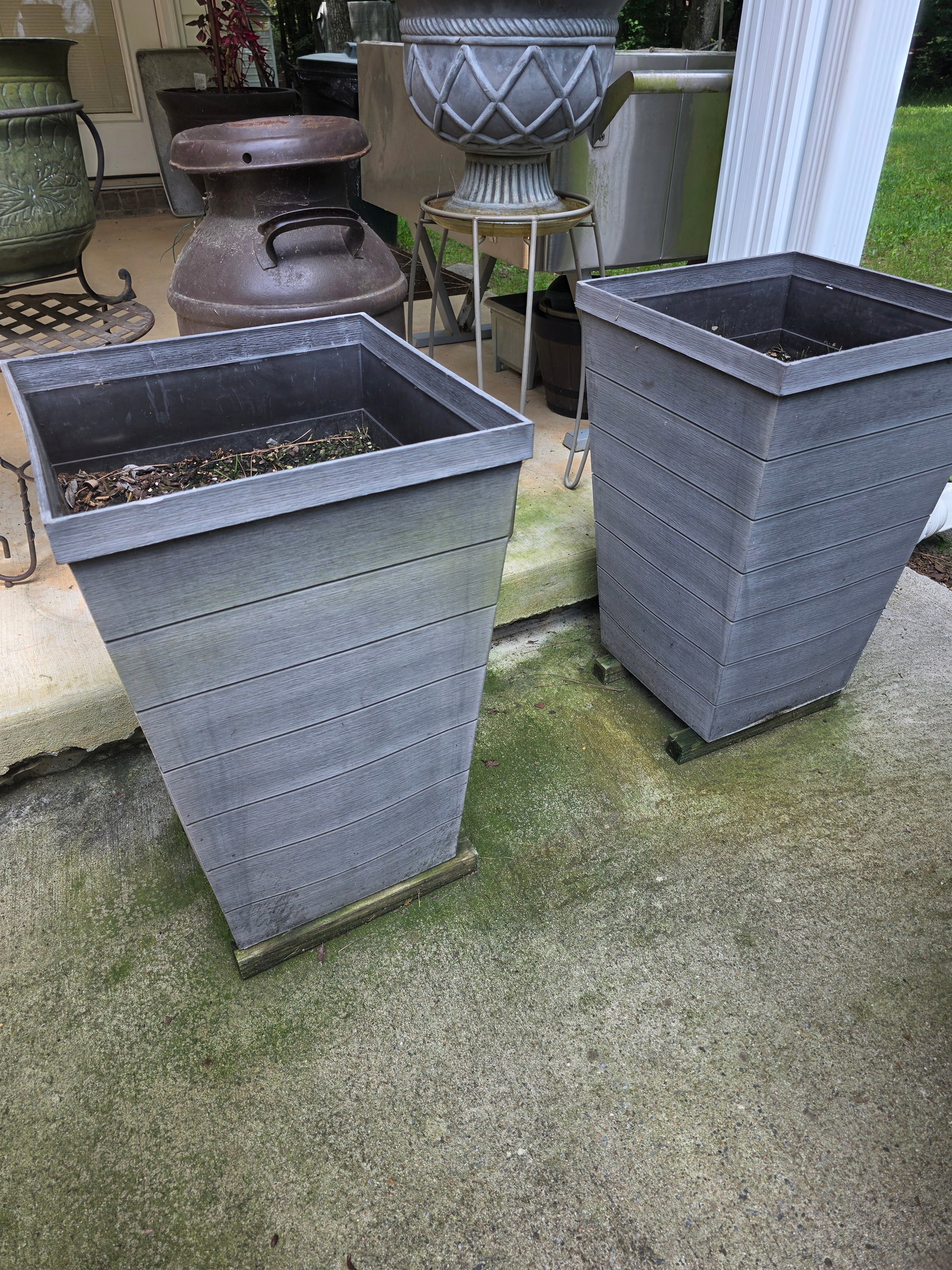 2 large platic planters - 2
