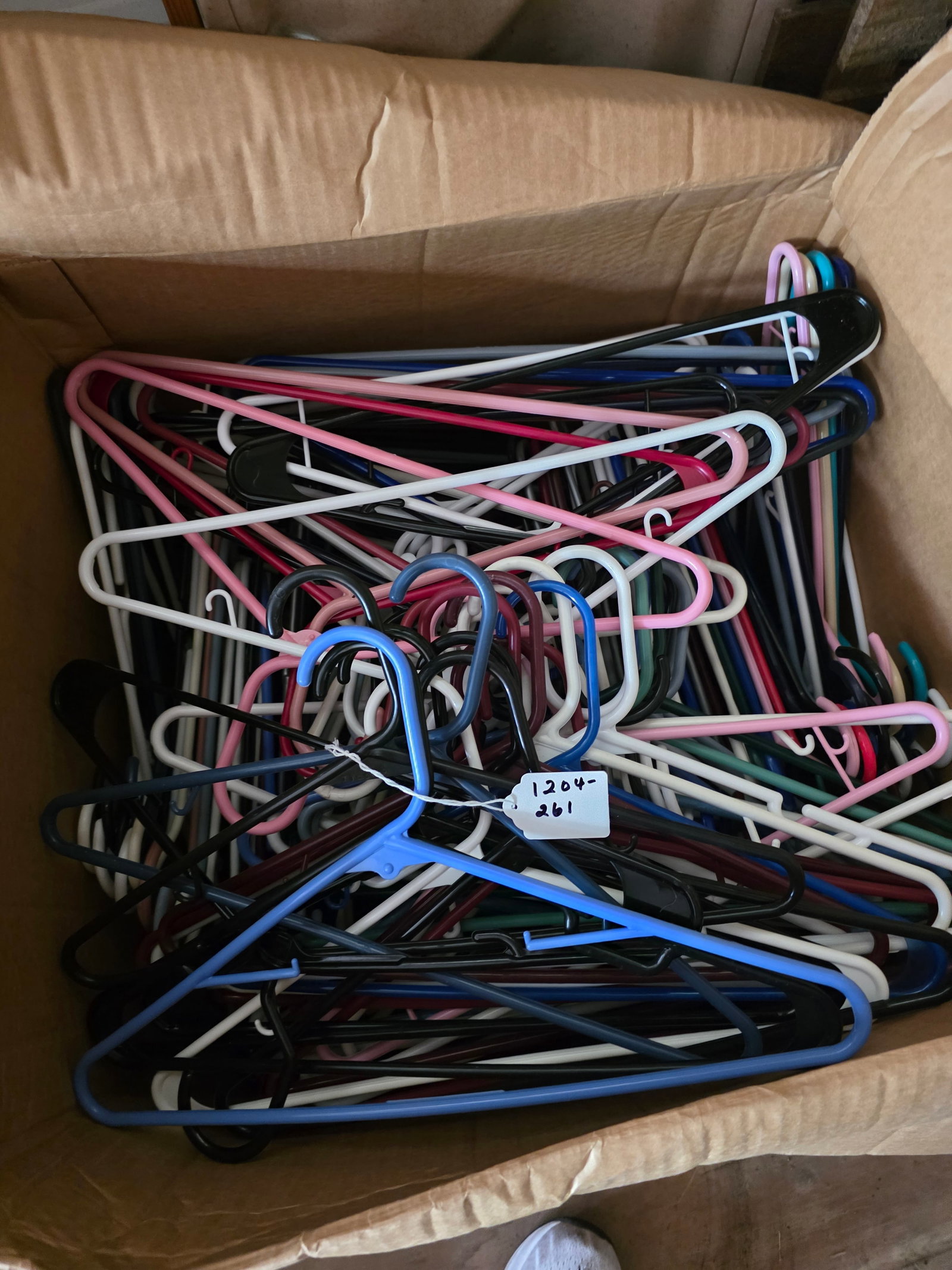 Large box of coat hangers: Plastic coat hangers big box is full of assorted colors