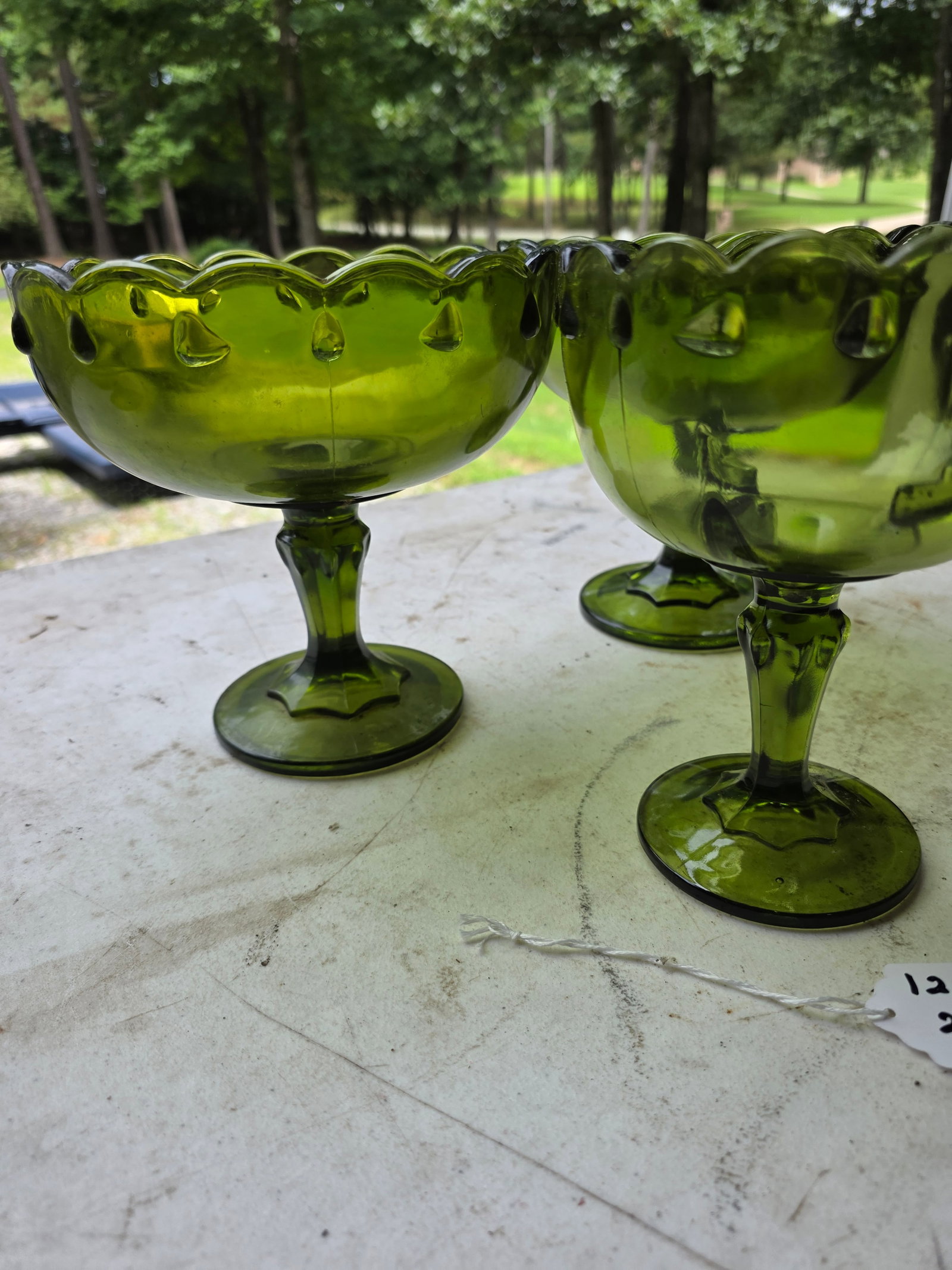 Vintage Indiana Teardrop Pedestal footed compote: these were crafted in the US during the early 20th Century they were used for a variety of uses during hosting gatherings No chips, cracks or breaksSet of 3