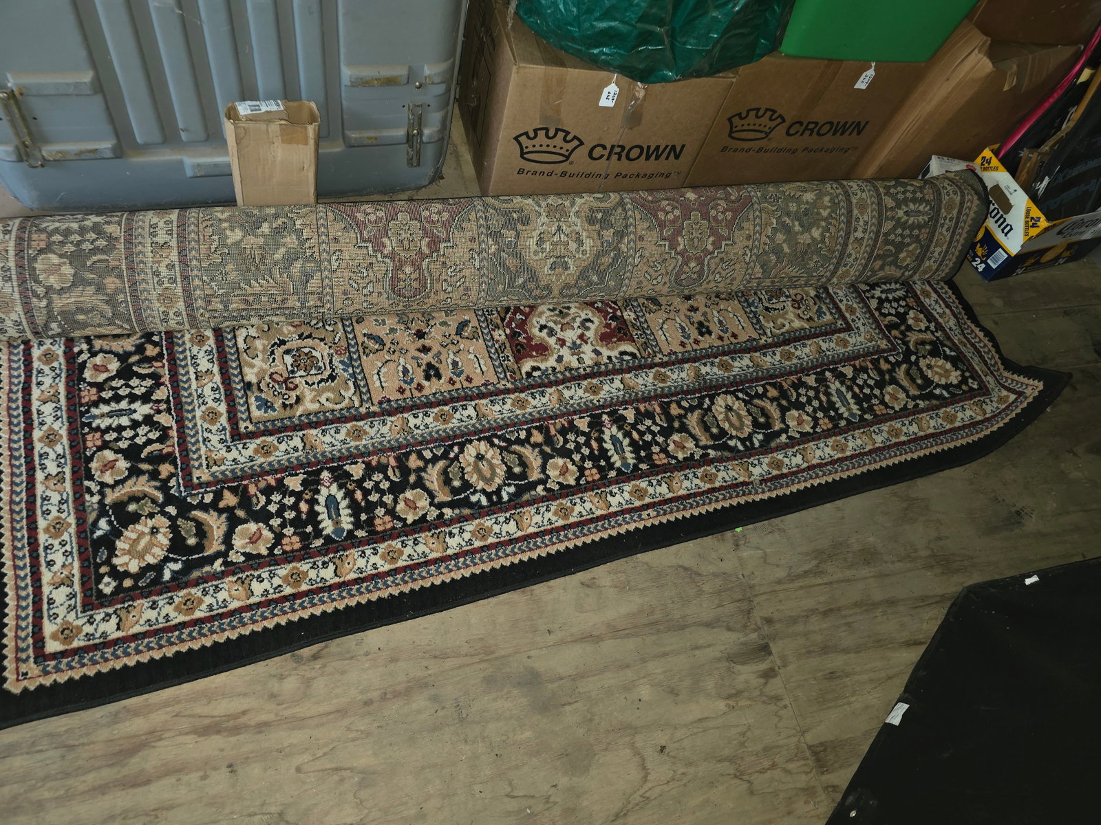Traditional Area Rug: Decorative traditional-style area rug featuring an ornate floral and medallion pattern in rich shades of navy, burgundy, cream, and tan. The classic design complements a variety of home décor styles