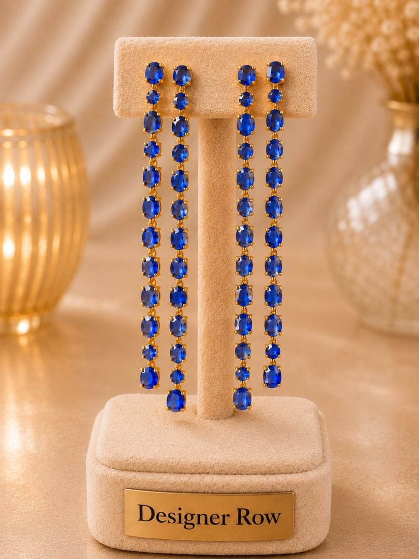 18KT Gold Blue Sapphire Drop Earrings: NOTE - Additional lots may be added until the final day of the auction. Please check back regularly for updates and newly added items. Exuding sophistication and timeless elegance, this exceptional pa