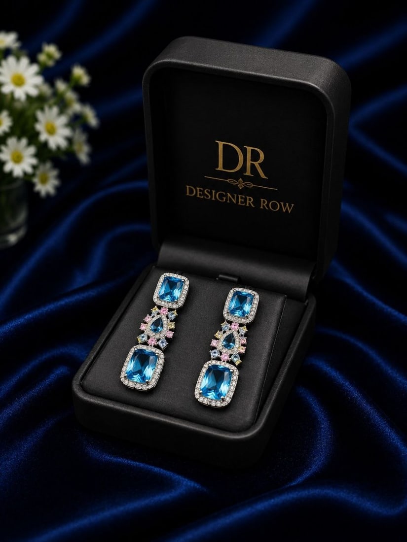 Handmade Blue Topaz 3-Tier Drop Gold Earrings: NOTE: Additional lots may be added until the final day of the auction. Please check back regularly for updates and newly added items. A pair of exquisite custom handmade drop earrings crafted in 925 S