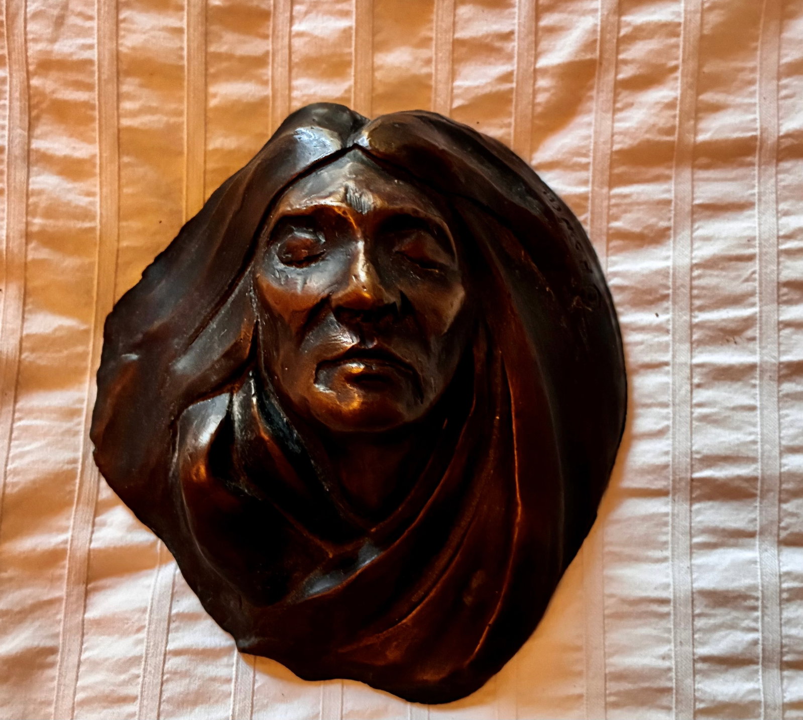 Unnamed Figure by Frank Howell: 6"x5" bronze sculpture. Born in Sioux City, Frank Howell (1937-1997) was an extraordinarily skilled artist, often working with oils, watercolors, sculpture, lithographs and mono-types. Howell resided 