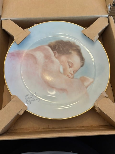 Bessie Pease Gutman, Sun Kissed, Plate # 1474A: Collectible Plate, 1987, Dinner plate of painting of sun kissed sleeping baby, Bundles of Joy Plate Collection, Eighth Issue,rim of plate is trimmed in 23K gold, distributed by The Heirloom Tradition,