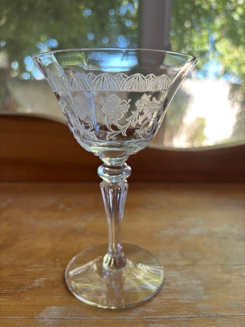 Tiffin Capri Passion Flower Wine Glass Set of 4: This lovely 1930s elegant etched wine glass with paneled optic bowl is the Capri or Passion Flower pattern by Tiffin. It stands nearly 6 inches high. The stem shape is number 15011. The glass is in pe