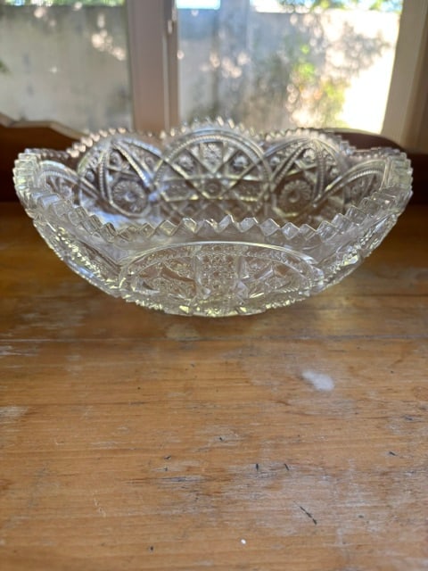 VINTAGE PRESSED GLASS BOWL SAW TOOTH SCALLOPED EDGES CIRCLE PATTERN STAR: This is a vintage saw tooth pressed glass bowl. It has the circle pattern with flower/star on the bottom. It is really a pretty bowl.MeasurementsHeight 3 1/2" Width 8 1/2"There are not chips or cracks