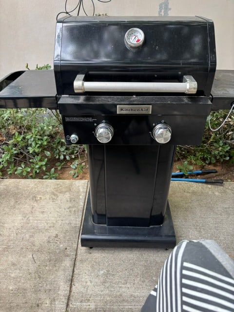 KitchenAid 2 Burner Propane Gas Grill in Black_720-0891DA: Made of premium corrosion resistant materials, it comes in a compact size that is great for small areas. It features convenient foldable side shelves and heavy-duty stainless steel wrapped cooking gra