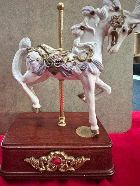 Vintage Westland Limited Edition Carousel Horse music box: This appears to be a vintage Westland Limited Edition Carousel Horse music box, likely titled "Carousel Waltz".The figurine features a white horse with intricate gold, purple, and red jewel-toned deta