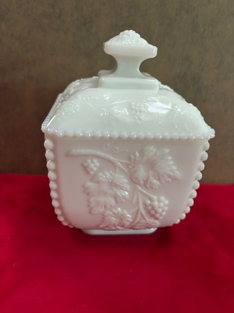 Vtg Westmoreland Milk Glass Beaded Grape Candy Trinket Dish w Lid 5.5 In Tall: This is a vintage Westmoreland white milk glass lidded candy dish featuring the "Beaded Grape" pattern.The square dish and lid are decorated with relief molded grape clusters, leaves, and a beaded edg