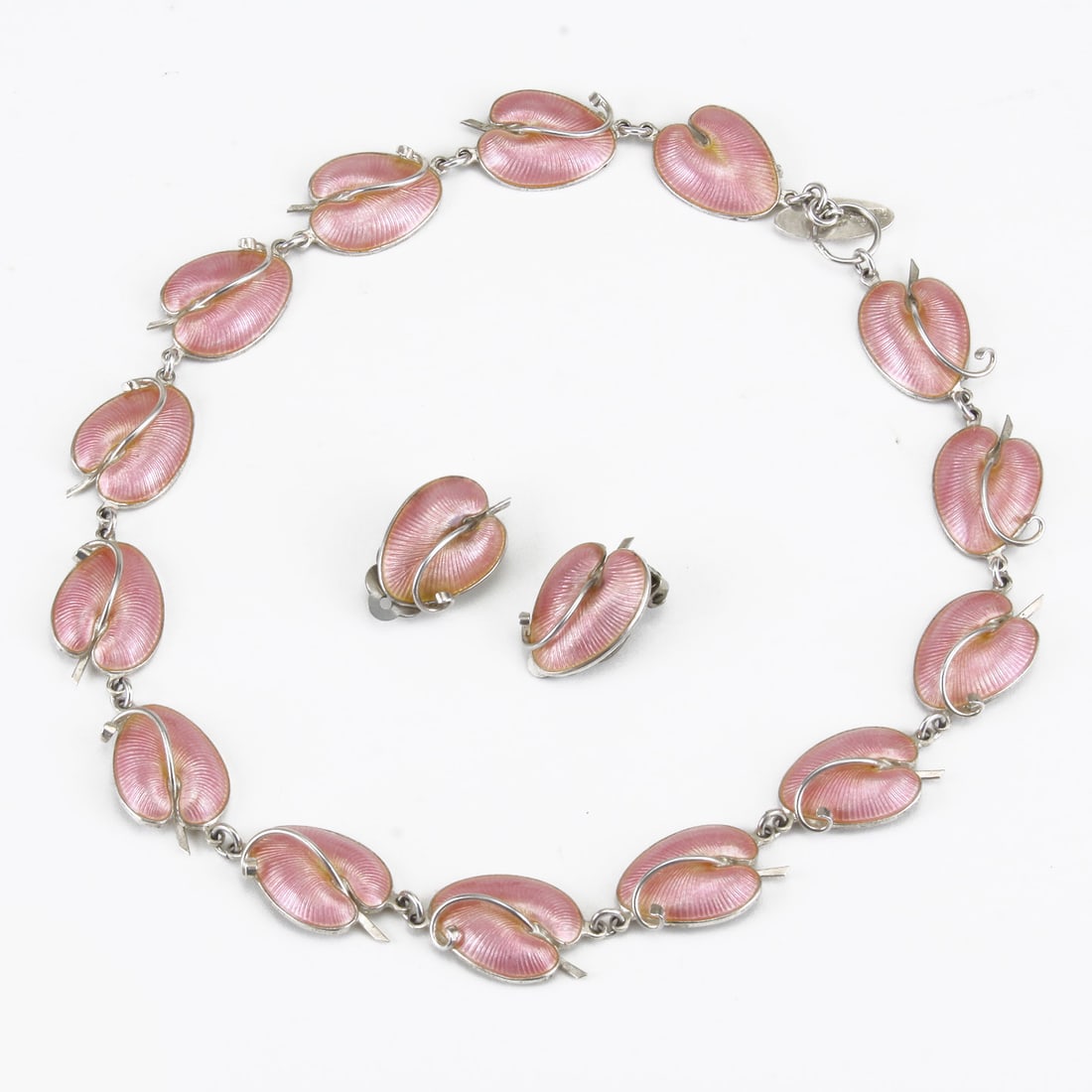 VOLMER BAHNER DEMI PARURE DANISH SILVER & GUILLOCHE ENAMEL NECKLACE/ EARRING: A VOLMER BAHNER DEMI PARURE DANISH SILVER AND GUILLOCHE ENAMEL NECKLACE AND MATCHING EARRINGS. With pink iridescent guilloche enamel interspersed by silver decoration, matching earrings of the same wi