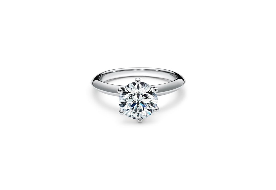 Tiffany & CO. 0.39ct Diamond Platinum Knife Edge Solitaire Ring Triple XXX: Tiffany & CO. 0.39ct Diamond Platinum Knife Edge Solitaire Ring Size: 7 The round brilliant-cut diamond measures 4.68 - 4.71 x 2.82 mm and weighs .39 carats. A Tiffany & CO report #D06063 (ser