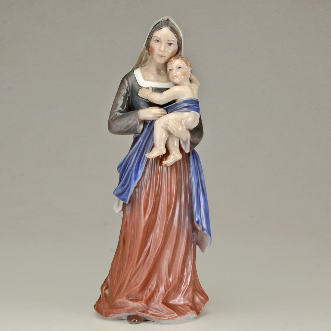 Dahl Jensen Copenhagen Porcelain Figure: Madonna & Child: Dahl Jensen Porcelain Figure: Madonna & Child Danish, 1874-1960, Madonna & Child; in multi color earth-tone glazes. Marked on the bottom: DJ COPENHAGEN DENMARK (printed green mark) REF: Model 