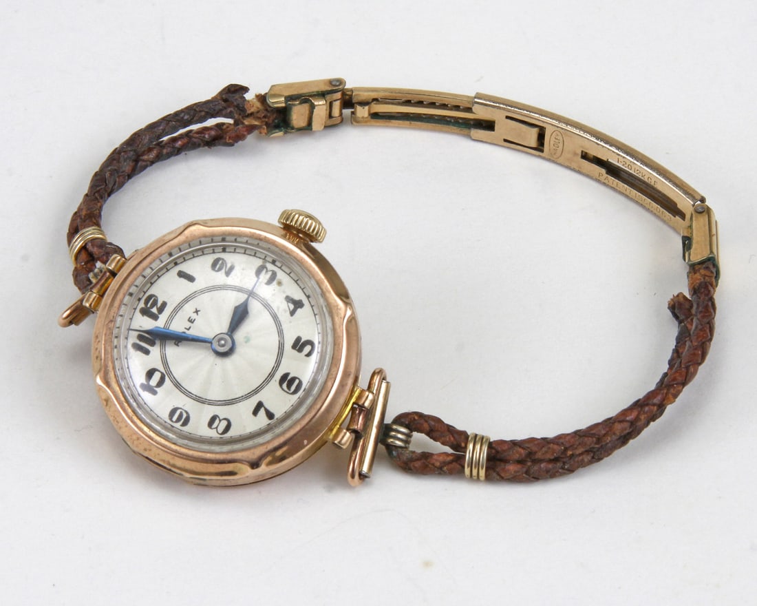 Rolex Circa 1940’s 9ct. 375 Ladies Swiss 15J Corded Leather Watch: Brand: Rolex Ref: Circa 1940’s Model: 9ct. 375 Serial: 198**** Gender: Ladies Movement: Swiss Automatic 15J Crystal Type: Acrylic Case Material: 9KT Gold Bezel Material: