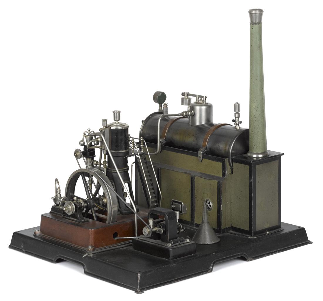 Marklin steam plant with marine style engine and all: Marklin steam plant with marine style engine and all the proper fittings, including a functioning dynamo, diamond plate ladders that provide access to catwalk, and a speckle paint decorated boiler bas