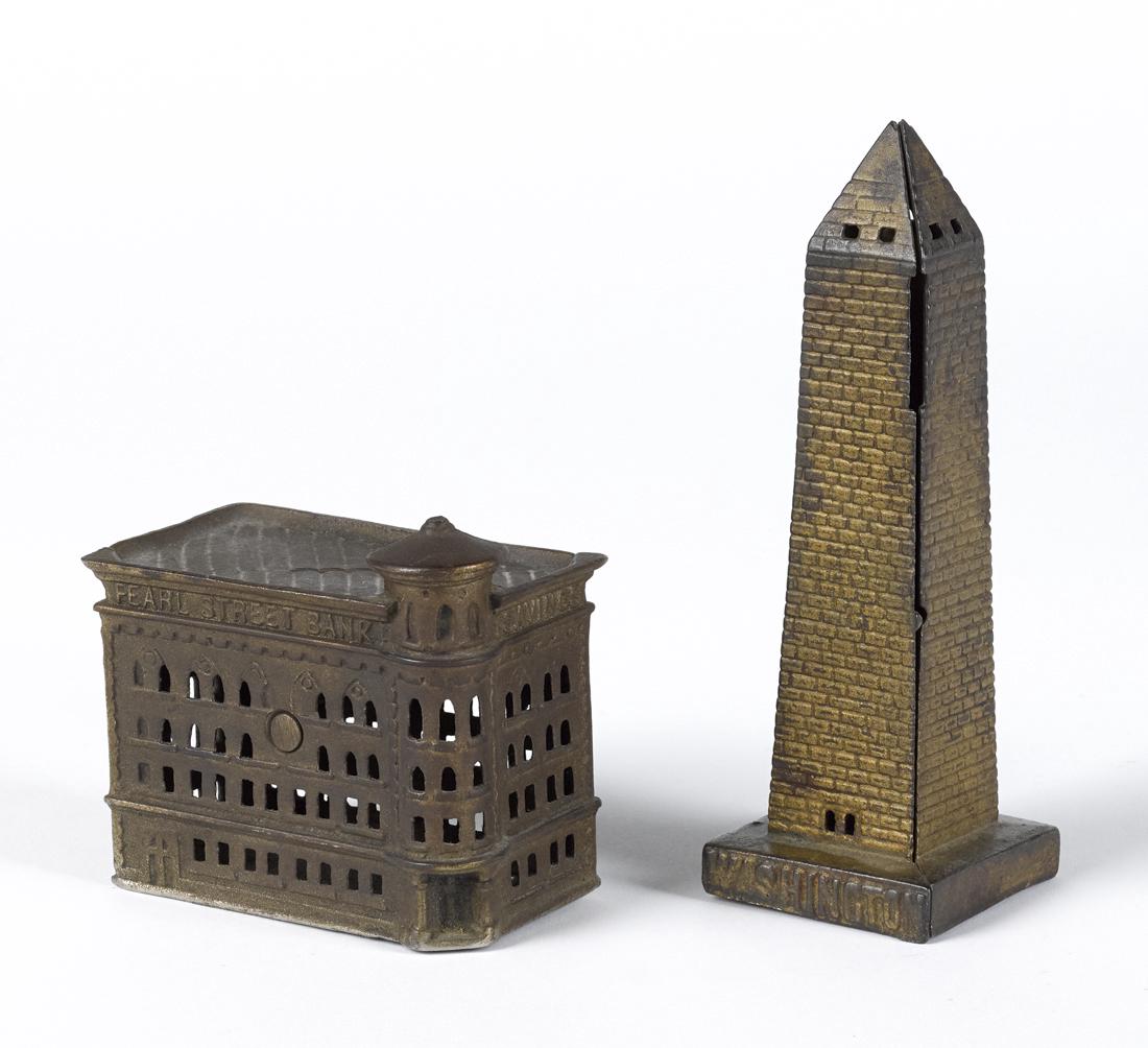 Two cast iron building still banks, to include an A.C. (1 of 1)