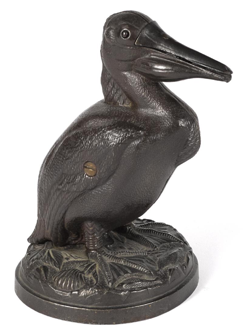 Trenton Lock & Hardware Co. cast iron Pelican-Man (1 of 2)