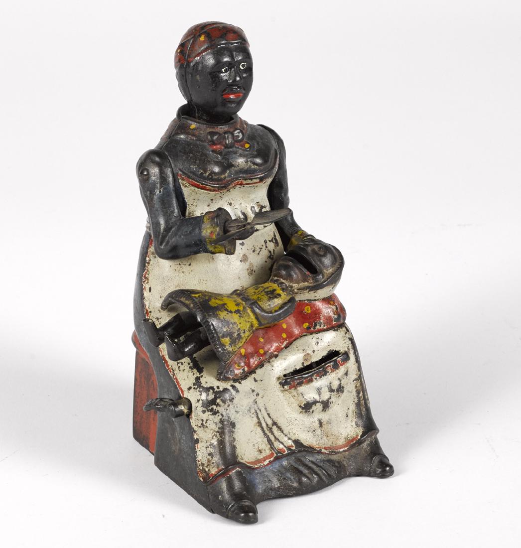 Kyser & Rex cast iron Mammy and Child mechanical bank.: Kyser & Rex cast iron Mammy and Child mechanical bank.