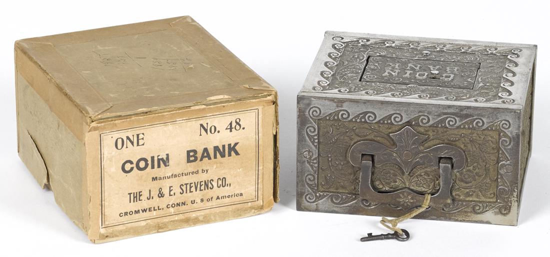 J. & E. Stevens nickel-plated cast iron Coin still bank: J. & E. Stevens nickel-plated cast iron Coin still bank with the original box, 4 1/4'' h.
