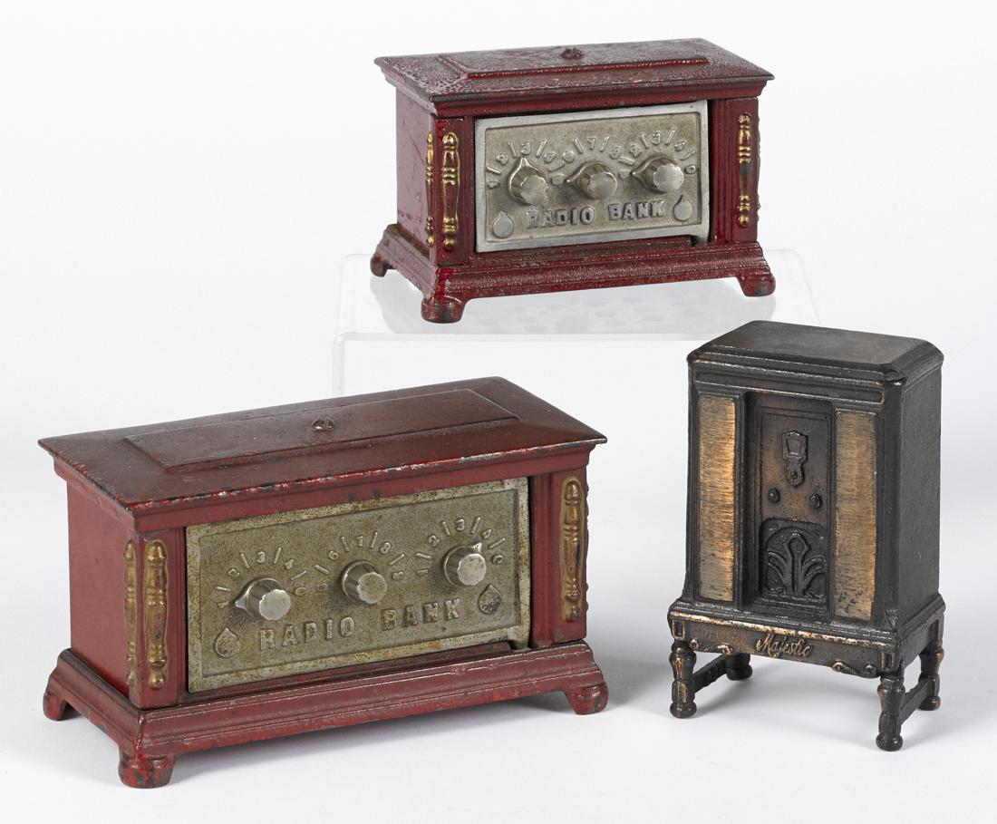 Three cast iron radio still banks, to include Arcade (1 of 1)
