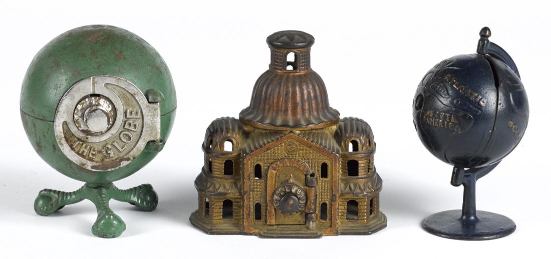 Three cast iron still banks, to include an Arcade dome (1 of 1)