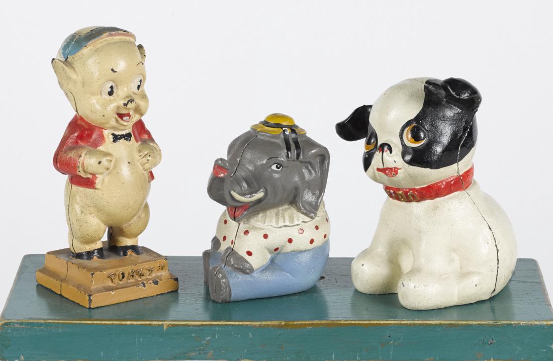 Three Hubley cast iron still banks, to include a Porky (1 of 1)