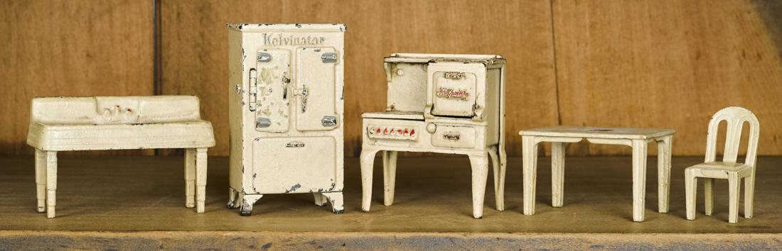 Arcade cast iron five-piece kitchen set, to include a (1 of 1)