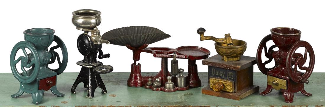 Four Arcade cast iron kitchen toys, to include two (1 of 1)