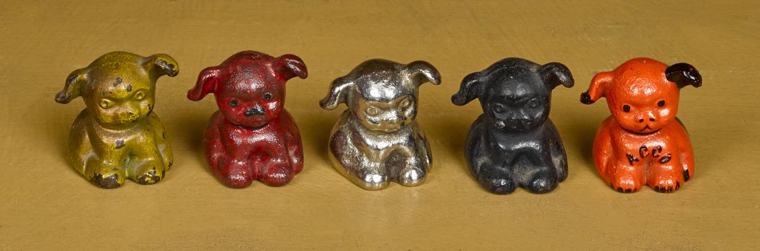 Five Hubley cast iron advertising pup paperweights, to (1 of 1)