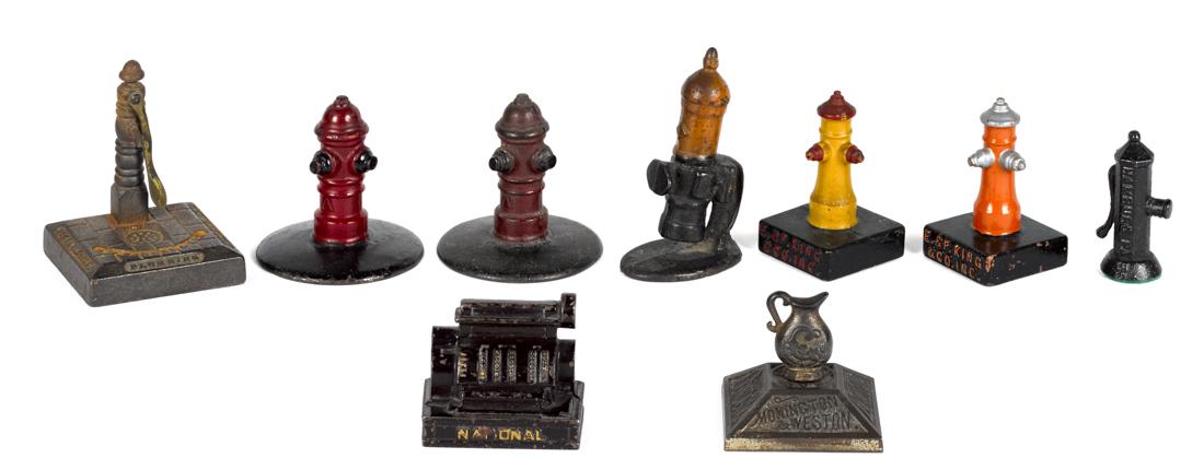 Nine cast iron advertising paperweights and novelties, (1 of 1)