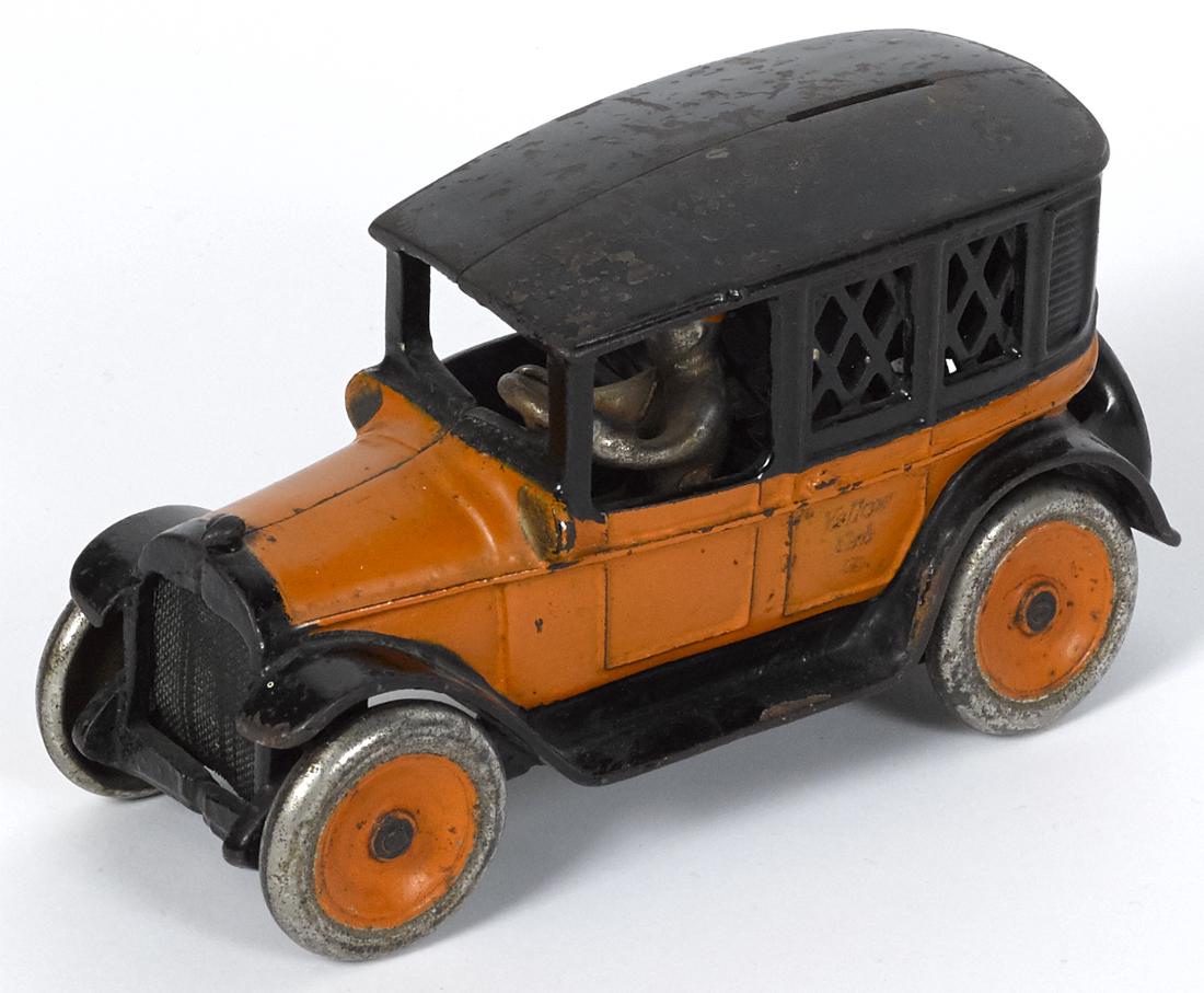 Arcade cast iron Yellow Cab bank with a nickel-plated (1 of 2)