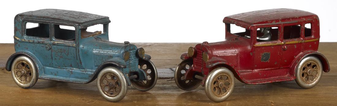 Two Arcade cast iron sedans, tudor and four-door, with (1 of 2)