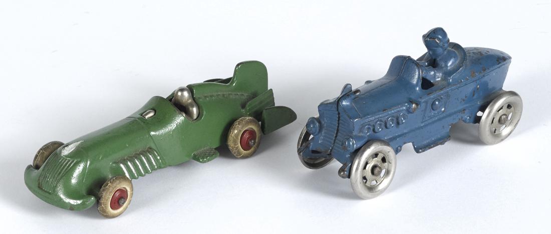 Two cast iron racers, to include an A.C. Williams with (1 of 2)