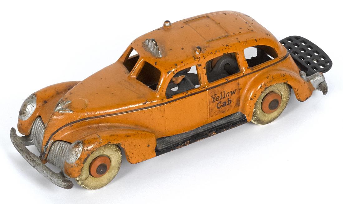 Hubley cast iron Yellow Cab with a painted driver and (1 of 2)